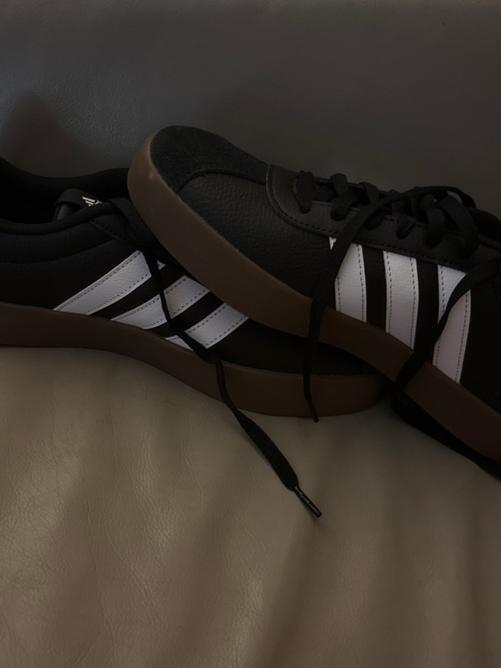Classic Men's Black Sneakers with White Stripes and Brown Sole adidas